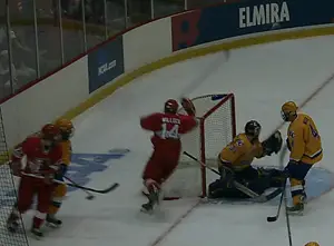 Andrew Willock (14) scores to give Plattsburgh a 5-3 lead. (Russell Jaslow)