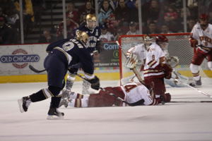 Jesse Martin blocks a shot. Photo by Candace Horgan