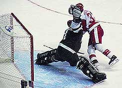 Big saves, like this one, from Providence's Nolan Schaefer, weren't enough to stop Wisconsin (photo by Christopher Brian Dudek).