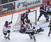 St. Cloud's Dave Iannazzo, left, celebrates his third-period goal Saturday night as linemate Peter Szabo (33) watches.