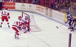 Martin Kariya sets up behind the BU net.