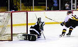 Ferris' Chris Kunitz scores his second of the game against Ryan Miller. (photo by Christopher Brian Dudek)