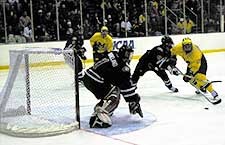 Michigan pressures the St. Cloud net in the third period. (photos by Christopher Brian Dudek)