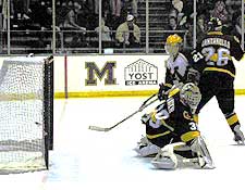 Minnesota puts one past CC goalie Jeff Sanger. (photo by Christopher Brian Dudek)