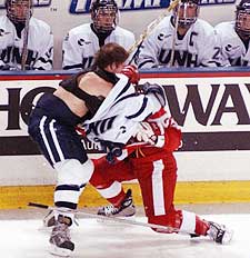 Things got physical between BU's Freddy Meyer and UNH's Jim Abbott.