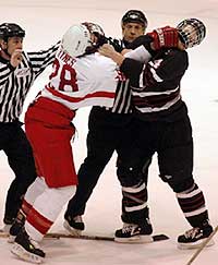 Things got testy late; here Cornell's Shane Hynes gets into a shoving match with Brown's Scott Ford.