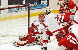 Dave LeNeveu makes a tough save, one of his 26, as Cornell defeated BU, 5-1, on Sunday. (photo: eLynah.com)