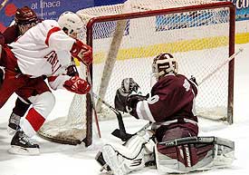 Sam Paolini pops in the rebound goal, which proved to be the game winner for Cornell. (photo: eLynah.com)