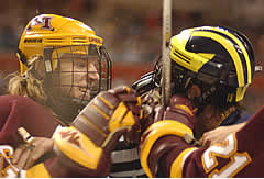 Vanek and Michigan's Jeff Tambellini get better acquainted (photo: Talya Arbisser).