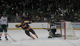 Matt Schmidt celebrates Toza Crnilovic's game winner.