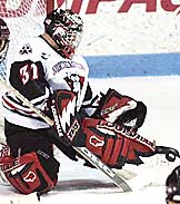 Northeastern's Keni Gibson battled UNH's Michael Ayers to a draw. (photo: Northeastern sports information)