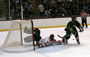 RIT goalie Tyler Euverman sprawls to make a save.