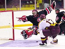 Derek Nesbitt fires wide of the Husky net.