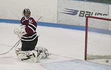 Union goaltender Mark Wise looks back in vain as a shot from Merrimack's Tim Reidy goes in. (photo: Jim Connelly)