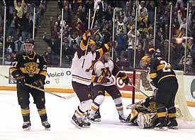 Gopher freshman Thomas Vanek scores the tying goal on the power play. (Photos by Jason Waldowski)