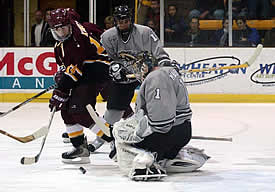 Bronco netminder Mike Mantua makes one his of 28 saves. (Photos by Christopher Brian Dudek)