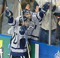 Sean Collins celebrates with Nathan Martz, after Martz's goal tied the game with just 1:09 remaining. (photos: Josh Gibney)