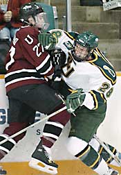 Union's Chris DiStefano and Clarkson's Lyon Porter collide. (photo: Christopher Lenney)