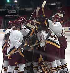 Minnesota celebrates a win paced by Krissy Wendell's hat trick (photos: Lee Urton).