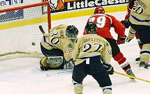 Dave Steckel scores a power-play goal in a high-paced first period.