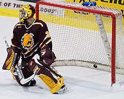 Mike Brown watches Michigan's tying goal in the closing minute.