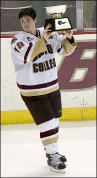 Ryan Shannon of BC with the Hockey East title trophy (photos: Melissa Wade).