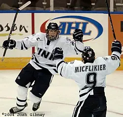 Daniel Winnik (l.) and Jacob Micflikier celebrate.