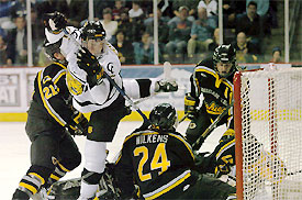 Scott McCulloch goes airborne through the crease scoring his first of three goals. (photo: Casey B. Gibson)