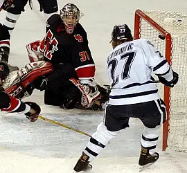 Daniel Winnik hits the crossbar after beating NU's Keni Gibson (photos: Josh Gibney).