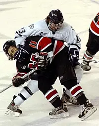 UNH's Brett Hemingway ties up NU's Jimmy Russo.