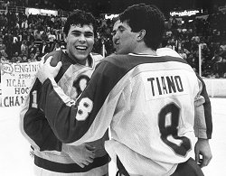 Adam Oates and John Tiano celebrate the Engineers' national championship.