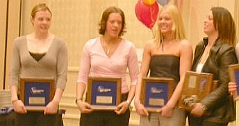 PC's Karen Thatcher and UNH's Steph Jones, Nicole Hekle and Melissa Bourdon are all smiles after earning All-Hockey East honors.