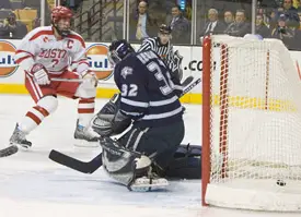 David Van der Gulik (l.) scores his second of three Friday-night goals against New Hampshire (photos: Melissa Wade).