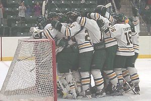 Oswego celebrates its win over Norwich Saturday.