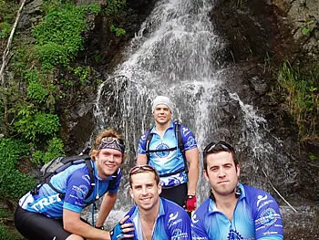 The riders stop for an early picture in Washington State at Snolqualmie Falls -- a 3200 foot climb.