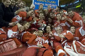 The Terriers celebrate postgame.