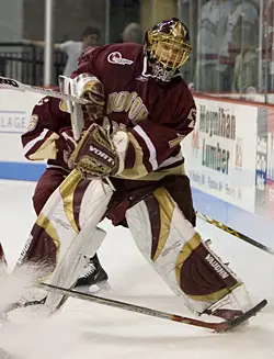 Cory Schneider clears the puck in action during Saturday's game (photo: Melissa Wade).