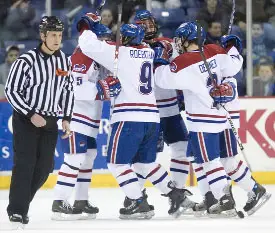 UML celebrates after Ben Holmstrom's goal to put Lowell up 1-0 midway through the first period (photos: Melissa Wade).  