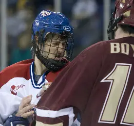 Holmstrom (l.) and BC's Brian Boyle battle after a whistle.