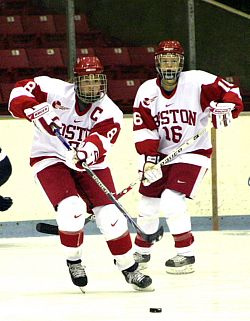 BU senior captain Cara Hendry (l.) and Sarah Appleton with the puck.