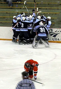 Fredonia celebrates its overtime victory. (photo by Tom Naeger.)