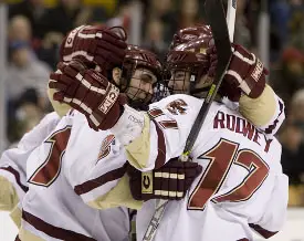 Benn Ferriero (l.) celebrates his goal with teammate Joe Rooney.