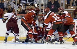 Ben Smith puts the puck home in the scramble for the puck. (photo: Melissa Wade)