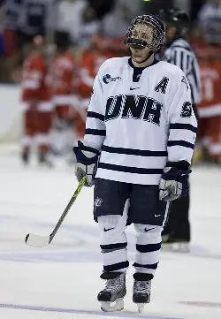 Jacob Micflikier is downtrodden after the Wildcats' loss to Miami. (photo: Melissa Wade)