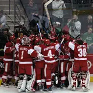 The Badgers celebrate their comeback win (photos: Skip Strandberg).