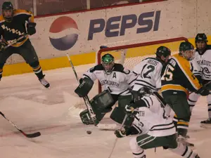 Mike Devine makes a save. Photo: Candace Horgan