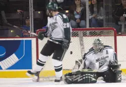 Teddy Ruth's slap shot gets by Jeff Lerg. Photo by: Candace Horgan