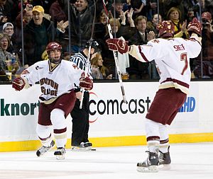 Nick Petrecki (left) and Carl Sneep celebrate Petrecki's first goal of the evening.