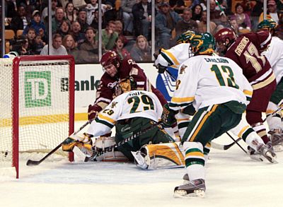 Ben Smith's goal gets through Vermont goaltender Joe Fallon en route to the Eagles' win.