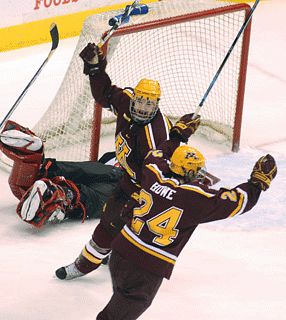 Mike Howe (24, foreground) scored the game winner Thursday night (photo: Tim Brule).